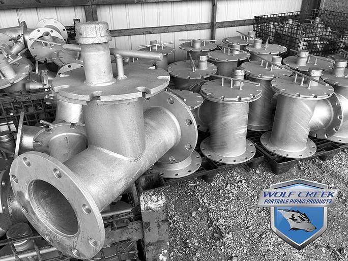 Hunnebuckets inline strainers from Wolf Creek portable piping